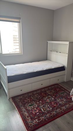 Twin bed with mattress