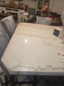 Marble dining table  with a chairs used but good condition