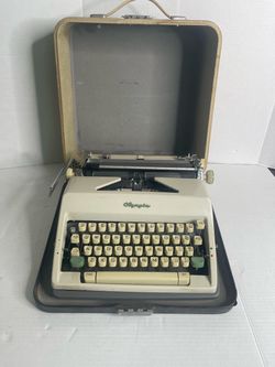 Vintage 1960’s Olympia SM9 Portable Typewriter & Case
