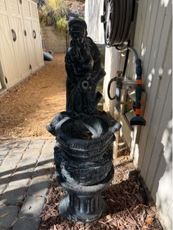 Metal and ceramic antique fountain