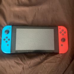 Nintendo Switch black with red and blue controllers