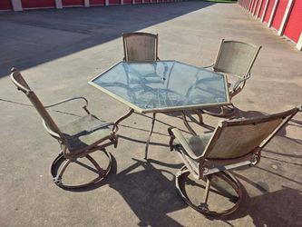 Patio table with swivel chairs
