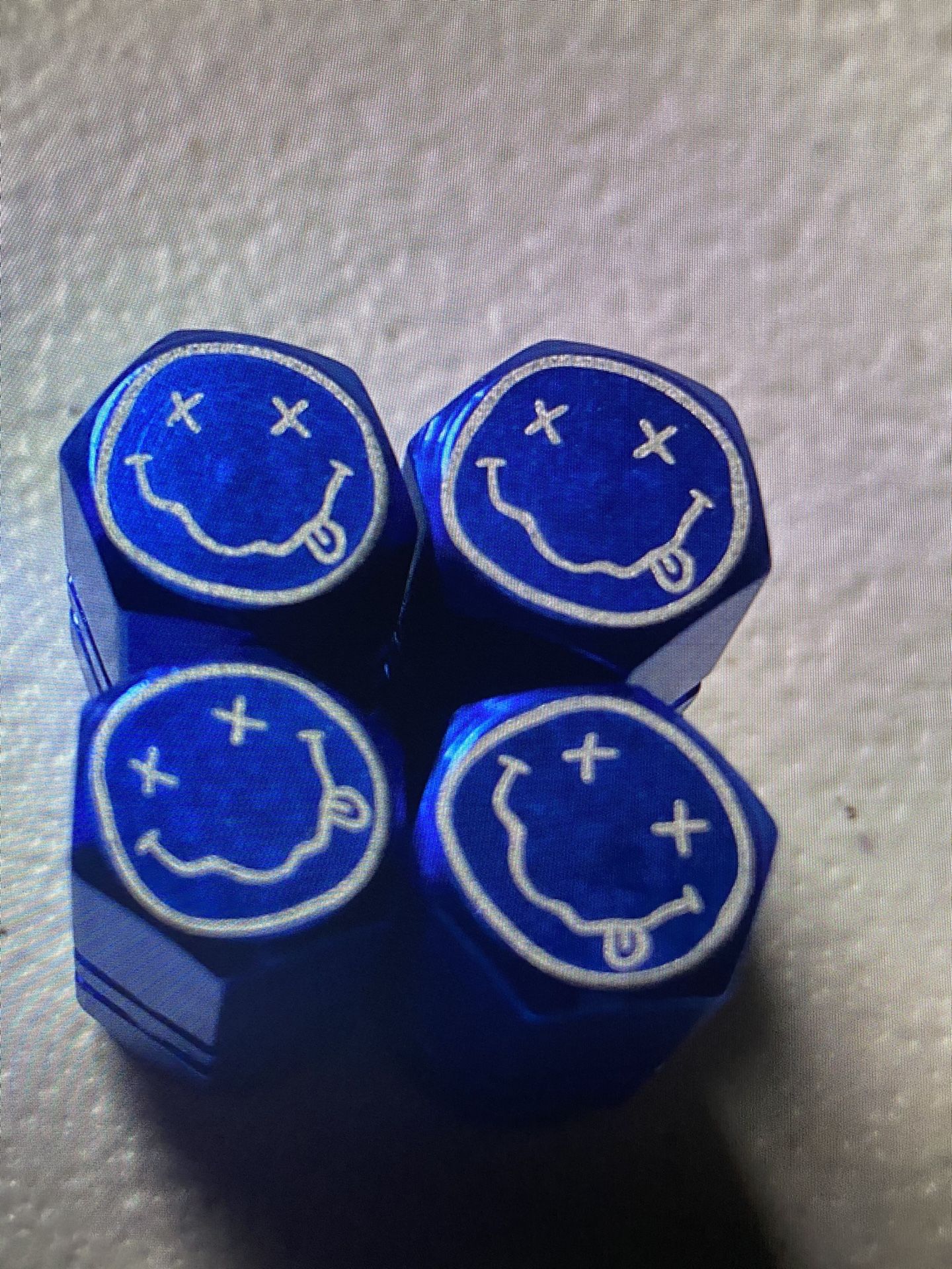 :-) Tire valve stem caps four pack