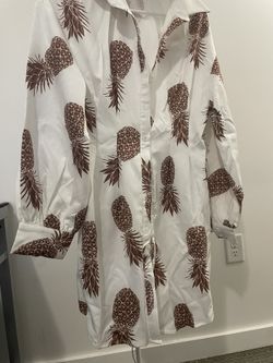 Fashion Nova Dress. Never Worn. With Tag. Great Outfit for Summer vacation! Great Material. Satin Feel.