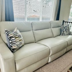 Luxurious Leather Power Reclining Sofa - Almost Newsd. Excellent Condition.