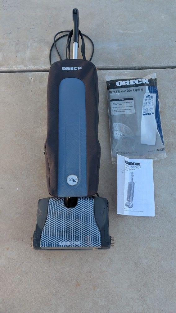Oreck vacuum cleaner XL 10 paid$ 375.00 still have a receipt, extra vacuum bags and instructions
