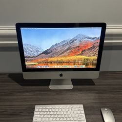 Apple iMac 21.5” (2010) with wireless Keyboard/Mouse