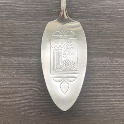 Vintage X111 Olympic Winter Games Lake Placid 1980 Silver Oneida Silversmiths souvenir server spoon. 9 1/4” long