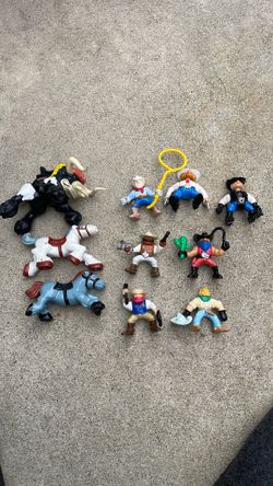 Fisher-Price Great Adventures Wild Western Town action figures and animals from the mid-1990