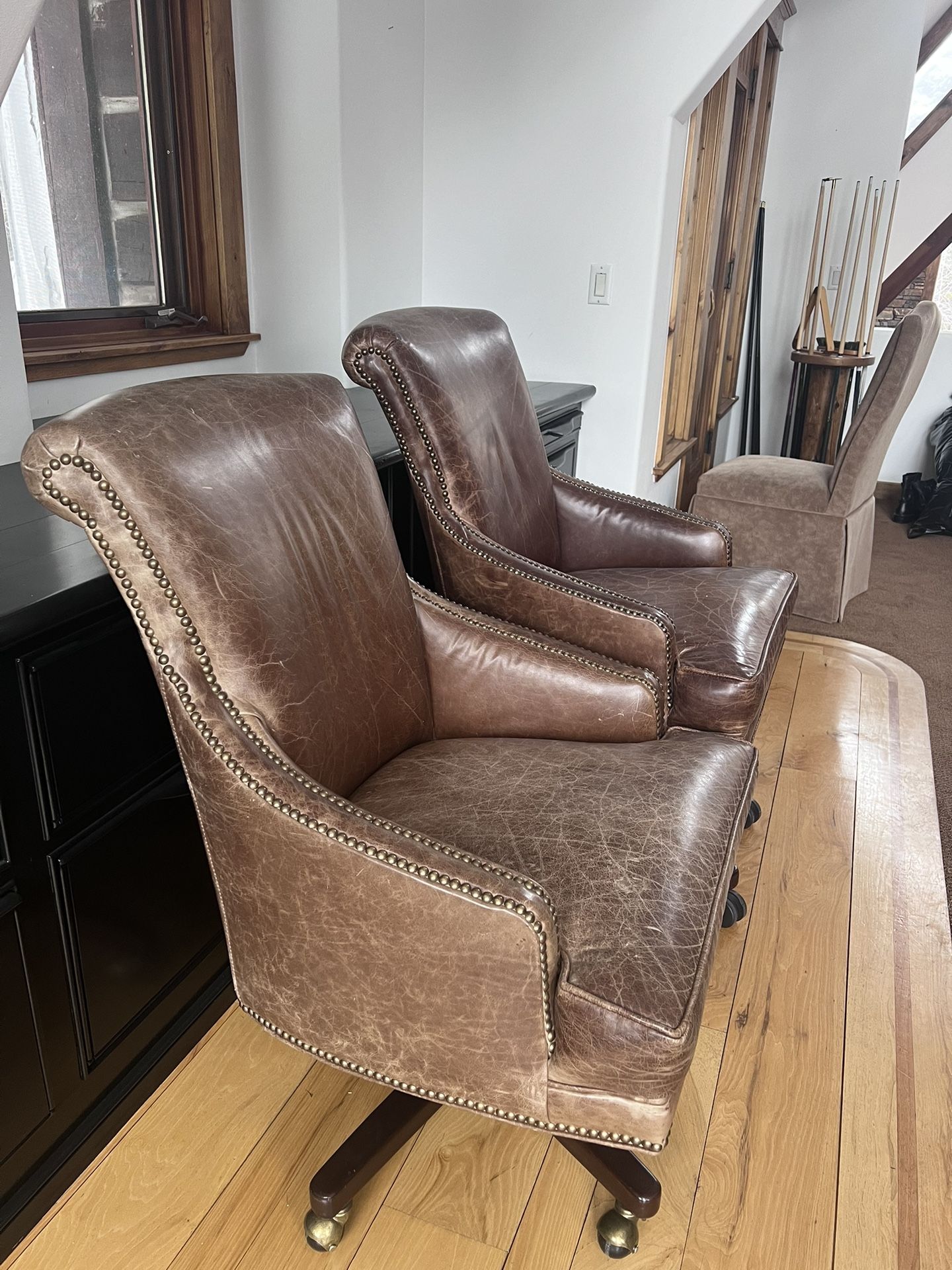 Two Leather Office Chairs