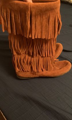 Minnetonka fringe boots. Size 9