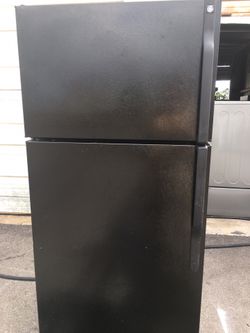 Ge black top and bottom refrigerator