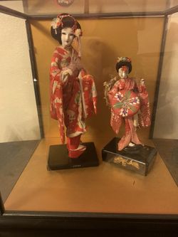 Vintage dolls in case