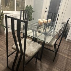 Glass dining table with 4 Chairs 