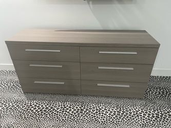Grey wood dresser with drawers