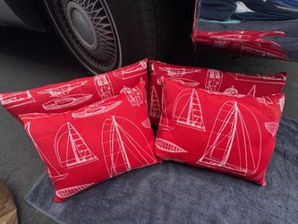 Set of seaside themed indoor/outdoor pillows