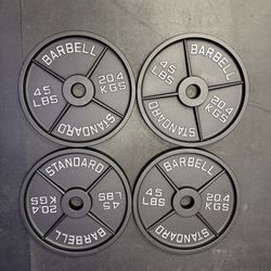 4 - 45s - Olympic weight plates - cast iron