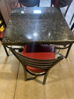 Granite tables with chairs
