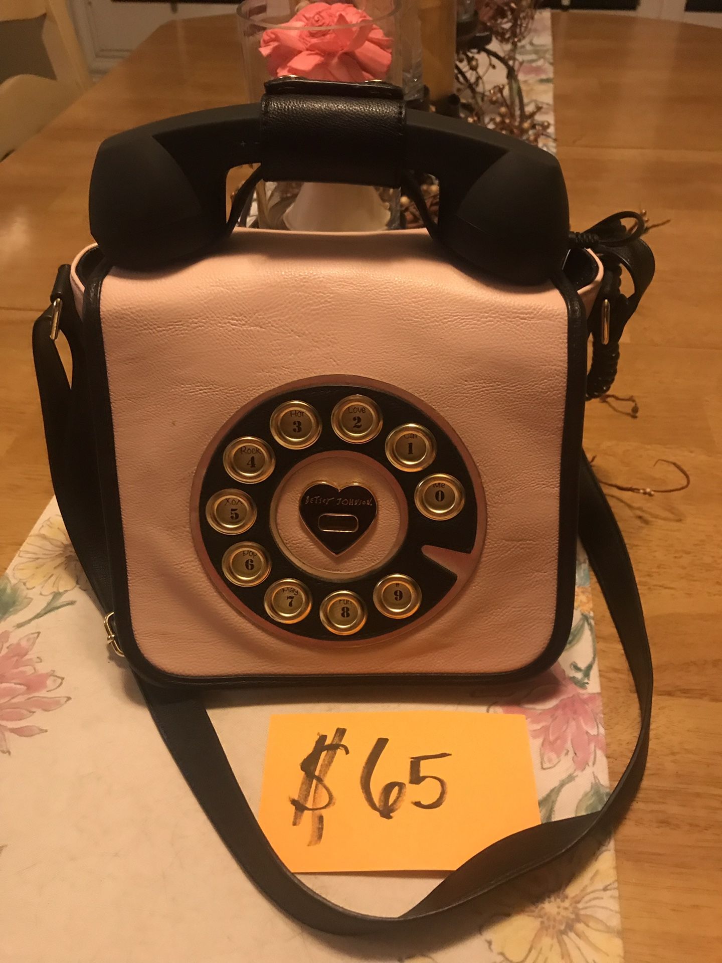 In Wasco Betsy Johnson use purse phone when connected to cell phone