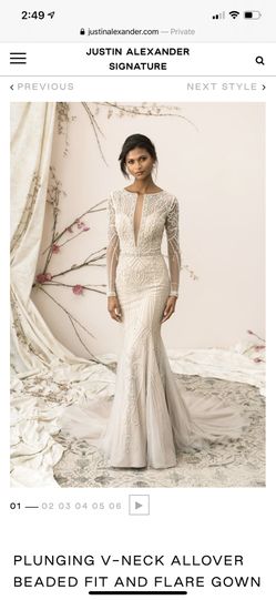 Justin Alexander gorgeous beaded wedding dress. $2000