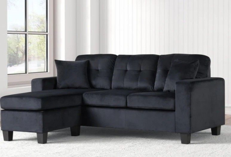 New/ Cris Black Reversible Sectional