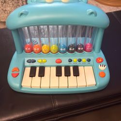 B. toys Toy Piano for Kids Hippo Pop