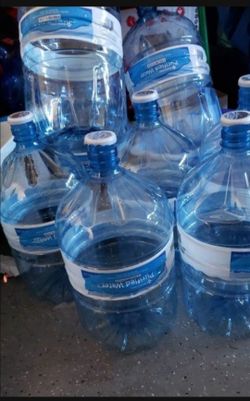Empty 4 Gallon water bottles w/ lid 5.00 each Or 5 for 20.00