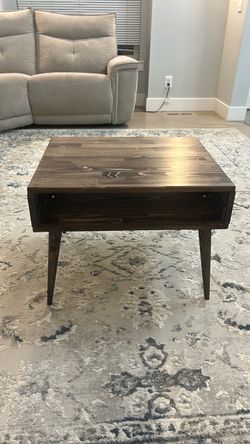 Brown wooden coffee table