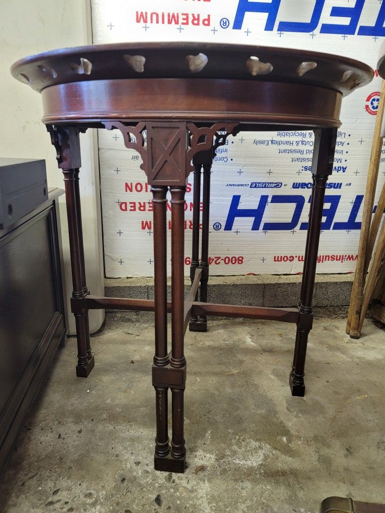 Round ornate Antique Table.
26.75w X 28h