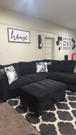 Black sectional w ottoman