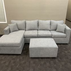 Grey Sectional And Ottoman