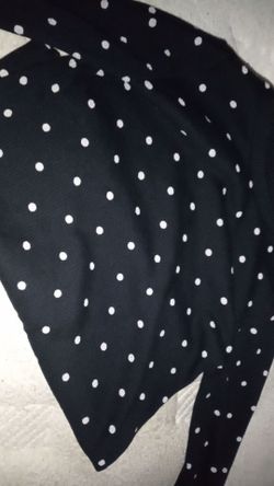 The brand is THEREABOUTS the color is black with white polka dots and size is 16