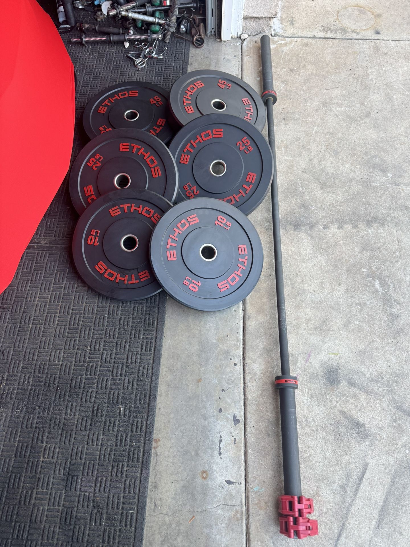 Ethos bumper weights set 160lbs total plus 7ft 45lbs bar