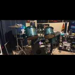 Drum set with leather motorcycle seat 