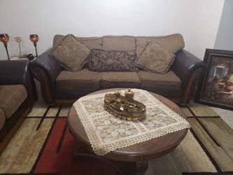 Sofa & love seat with coffee table & end tables and rug also included
