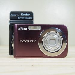 Nikon Coolpix S210 8.0MP Digital Camera Plum Bundle w/Charger + Battery Tested Comes with: Camera Charger Wrist Strap *Guaranteed to work! FULLY TESTE