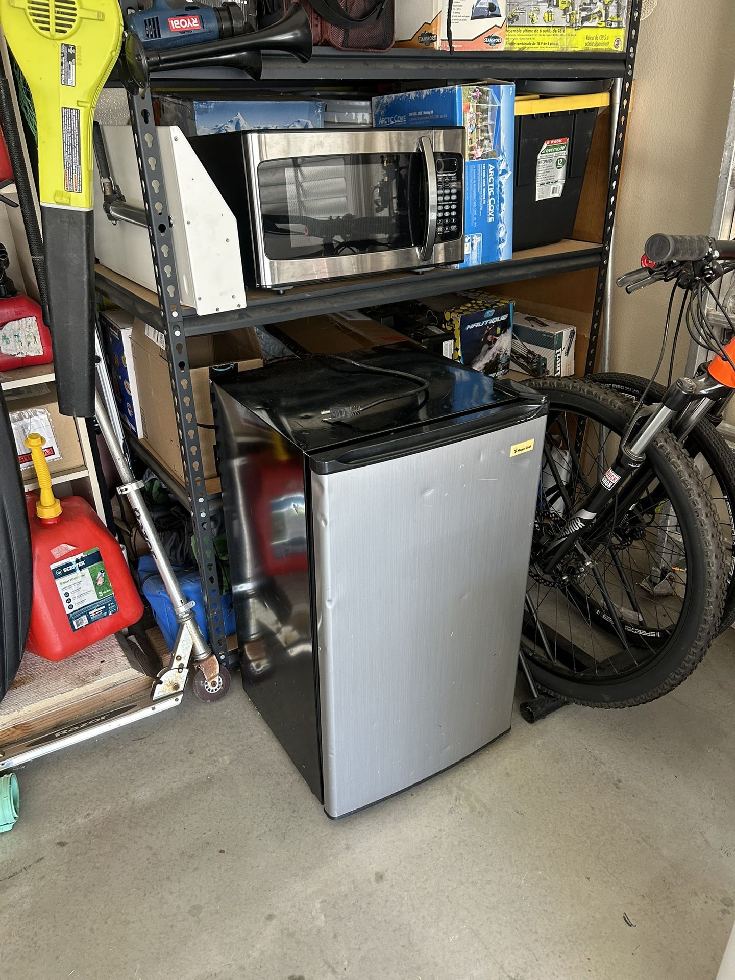 Small Kitchen appliances. Fridge And Microwave