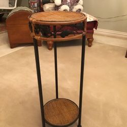 Wicker Side Table 25” tall x 10” wide with metal legs and trim 