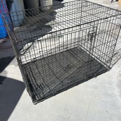 Dog Kennel 31” H  X 28” D X 42” W 