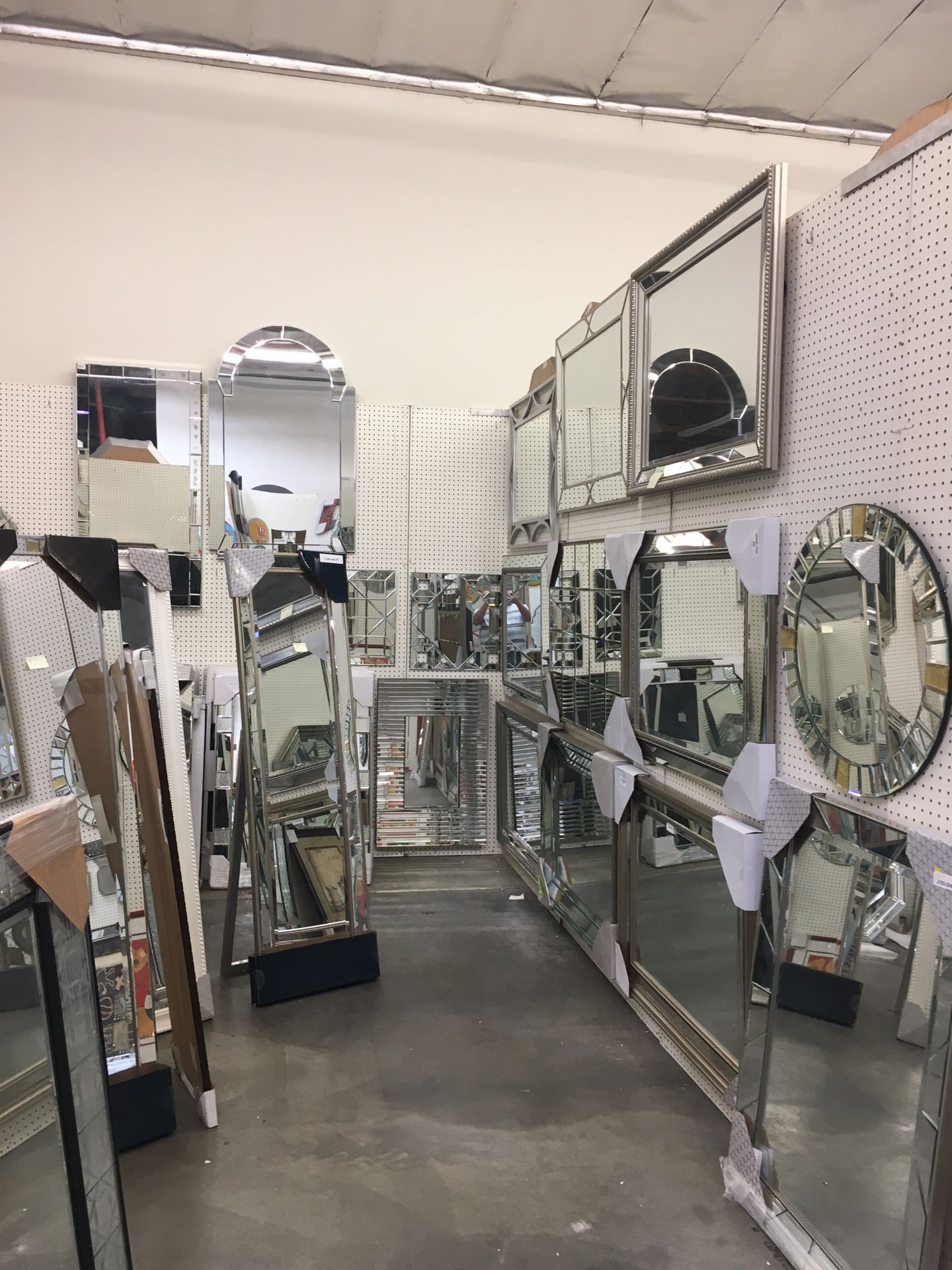 Largest selection of mirrors and wall decor items. Huge sale. Every thing must go. Selling Below Cost Starting at $20