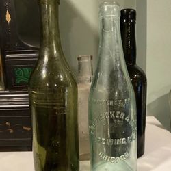 Four Antique Bottoes - one Blown Glass
