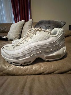Nike Air Max 95s in the classic "Triple White" colorway