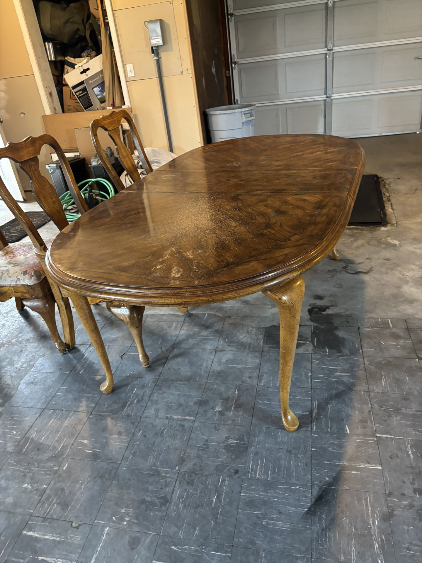 Dining room table with six chairs and two leafs