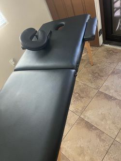 Massage table