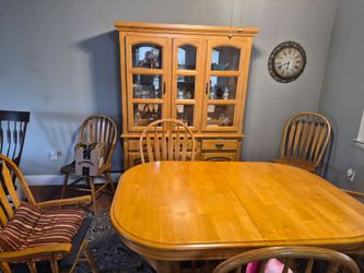 Dinette show with Hutch six years two arm chairs glass shelves great condition extra Leaf must go $200