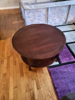 Round wooden coffee table