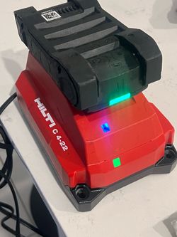 HILTI  CHARGER WITH 22 battery battery