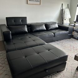 Black Leather Sectional with Storage Ottoman