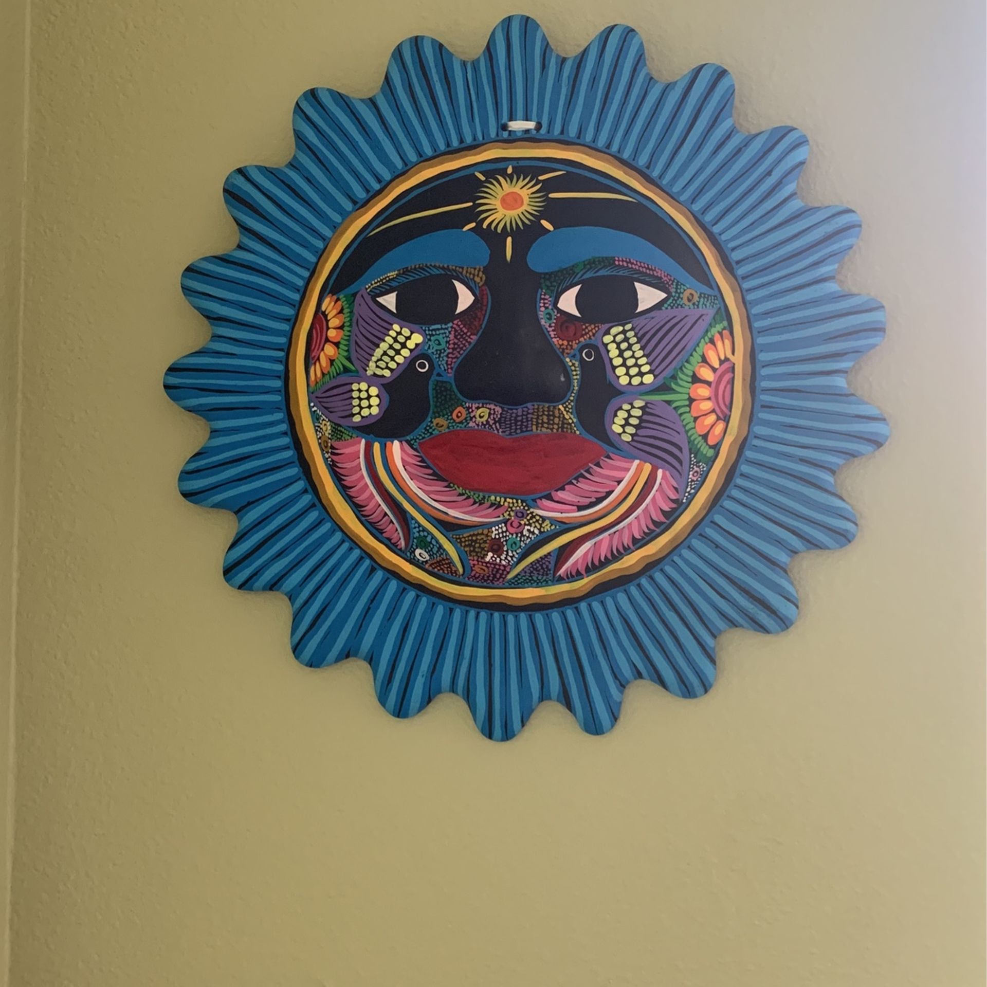 Hand Painted Clay Sun.
