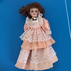 Vintage style porcelain doll